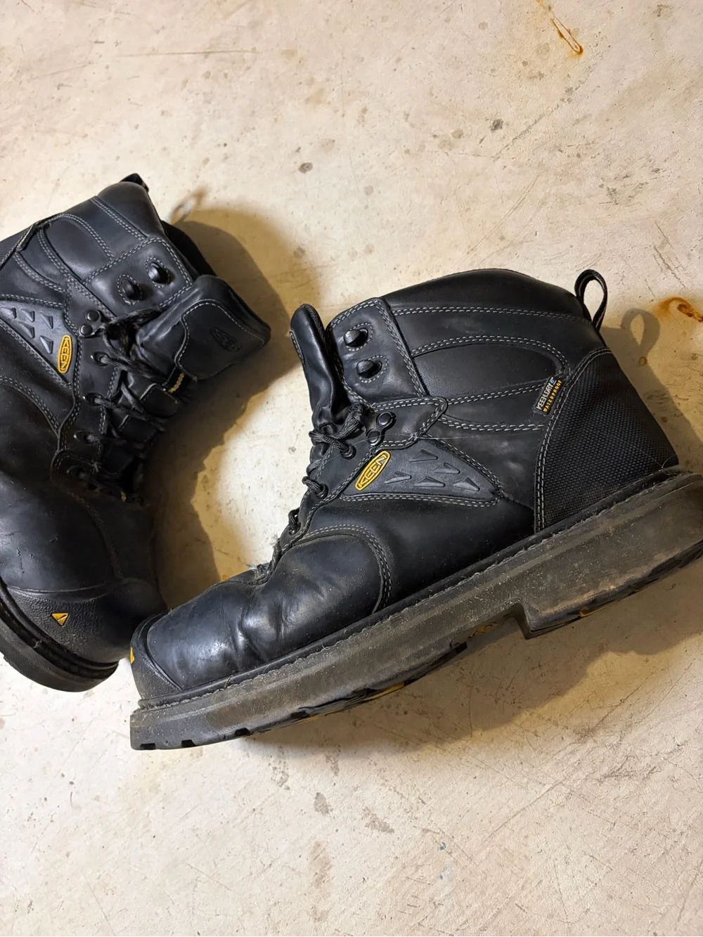 Keen Men's Black Lace-Up Work Boots with Yellow Accents